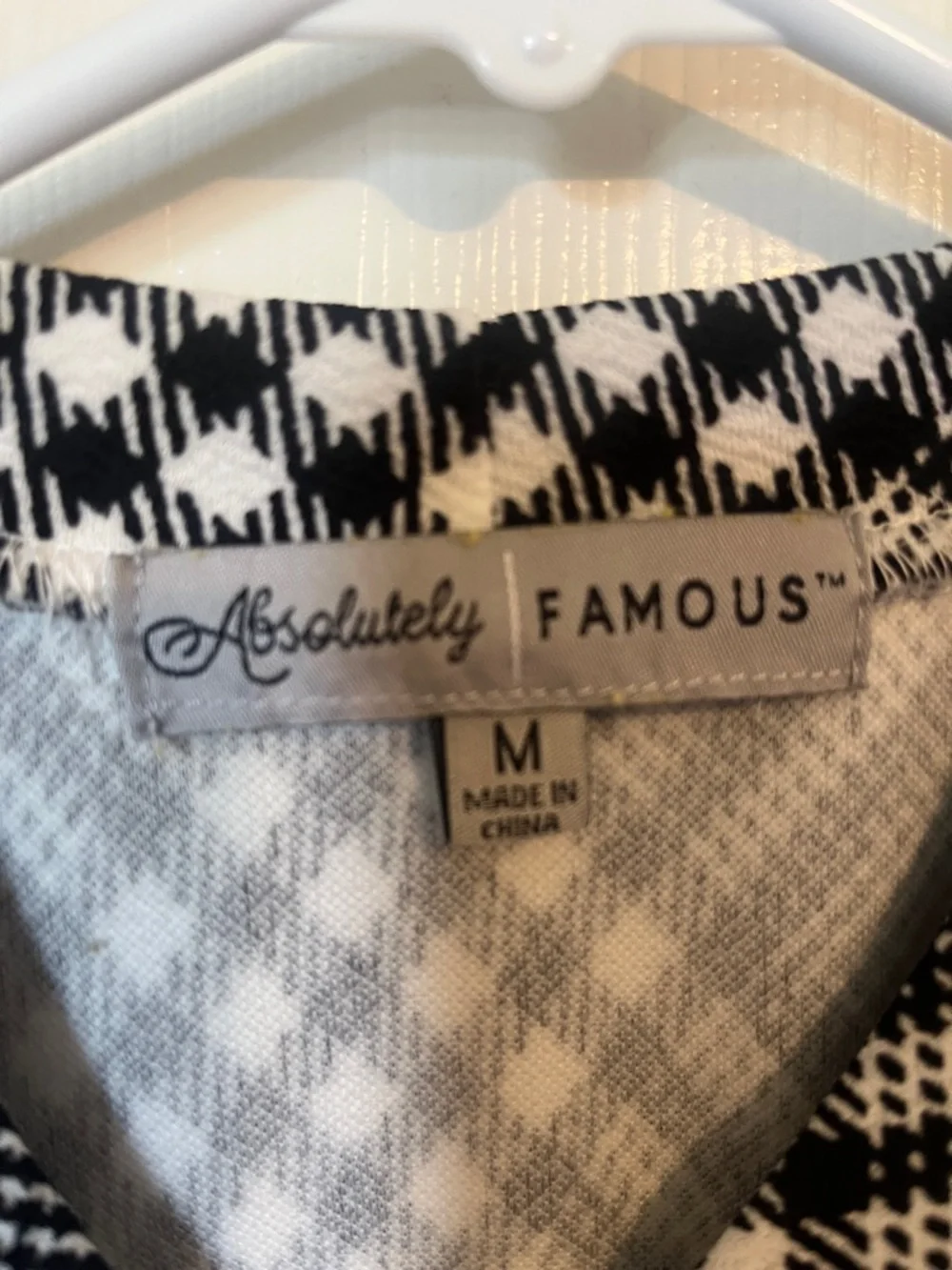 Absolutely Famous Black-and-White Plaid Panel Peplum Blouse - Picture 3 of 3